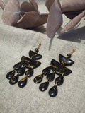 Boucles multi-pampilles gouttes noires et dorées